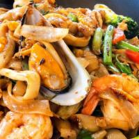 Drunken Nooodle · Big flat rice noodle , egg, brocoli, carrot, green bean, bell peppers, onion , garlic and fr...