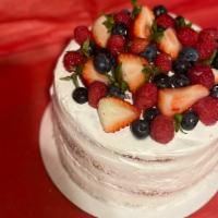 Naked Berry Cake · Vanilla whipped topping icing with vanilla cake. Filling…strawberries, blueberries and raspb...