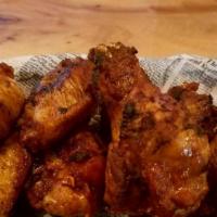 Chicken Wings · Grilled wings with your choice of bbq, sweet and spicy or hot.
