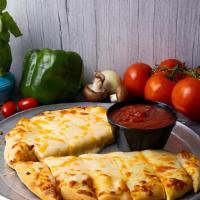 Bread Sticks With Cheese · Includes pizza sauce.