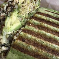 Veggie Monster Wrap · Vegan. Spinach Wrap, Organic Quinoa, Avocado, Alfalfa Sprouts, Hummus, Almonds, Sundried Tom...