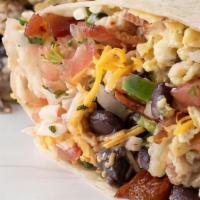 Mama'S Burrito · Flour tortilla filled with cage free scrambled eggs, shredded hash browns, chorizo, black be...