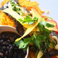 Steak Chimichurri · Jet favorite. Grilled onions, yellow rice, black beans, roasted vegetable.