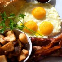 Banyan Breakfast · Jet favorite. Three eggs any style, bacon, sausage, breakfast potato or grits, choice of toa...