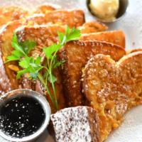 Crunchy Brioche French Toast · Jet favorite. Almond-cornflake crust, warm maple syrup, whipped butter.