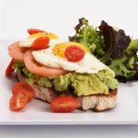 Jet Cafe'S Avocado Toast · Sunny-side up egg, vine ripe tomato, rustic toast, breakfast potatoes or grits.