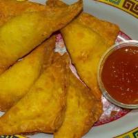 Crab Rangoon · 5 count of Crab Rangoons with cream cheese & imitation crab serve with sweet n sour dipping ...