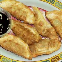 Potsticker · Shown above is Fried Potstickers with pork, cabbage, & onions. Can also be steamed instead o...