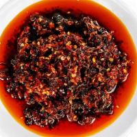 Chili Oil · Freshly made daily to spice up your order.