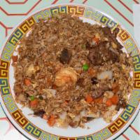 Fried Rice · Shown above is our New York Style House fried rice with shrimp, beef, pork, & chicken along ...