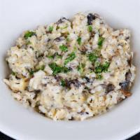 Mushroom Risotto · Wild mushroom risotto with a touch of cream and garlic.