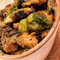 Charred Brussel Sprouts · Gluten free. Candied walnuts, balsamic reduction.