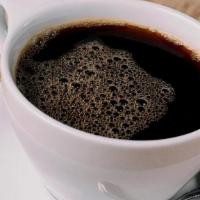 Americano · Organic espresso and hot water