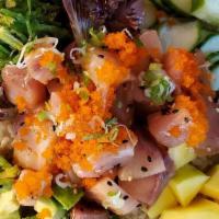 Poke Bowl · Your choice of fish, seaweed salad, avocado, cucumber, mango, and masago topped with sushi r...