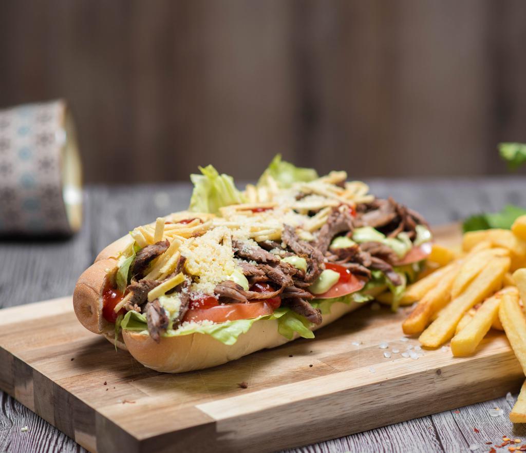 Grilled Angus Beef Pepito · Served with lettuce, tomato, parmesan cheese, potato sticks, and special sauce.