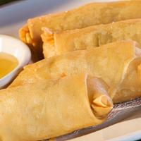 Spring Roll · Four piece. Crispy spring rolls stuffed with vegetables. Served with plum sauce.