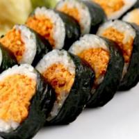 Dynamite Roll · Baked mixed seafood, masago, mayonnaise, and seaweed outside.