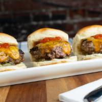 Tavern Sliders† · Mini burgers on slider rolls with cheddar cheese, dill pickle relish and spicy ketchup.