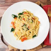 Fresh Linguini (V) · (V) Linguini, diced tomatoes, spinach, fresh basil oil and jalapeño butter, finished with fr...
