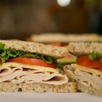 Turkey Club Sandwich · Best Seller! A triple decker sandwich with bacon, turkey, swiss, lettuce, tomato and mayo on...