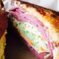 New York Pastrami · Pastrami on marble rye with provolone, cabbage slaw & Thousand island dressing.