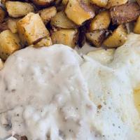 Ol' Country · Country fried steak topped with sausage gravy and two eggs any style served with your choice...