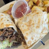 Philly Cheese Steak Wrap · Six oz. Sirloin steak, swiss cheese, lettuce, tomato, grilled onion, and mayo.