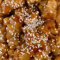 S-1. Sesame Chicken · Chunks of boneless chicken marinated and fried until crispy in a tangy sauce, sesame seeds o...