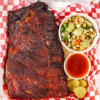 Half Rack Of Ribs · Half Rack of Dry Rubbed Ribs, One Side, Butter Bread, B&B Pickles, and Sauce