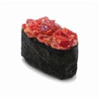 *Spicy Tuna (Seaweed Outside) · Raw. Tuna sesame seed with spicy sauce.
