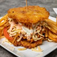 Patacon De Pollo Mechado · Shredded Chicken, lettuce, tomato, cheese, potatoes stick, sauces and fries on the side