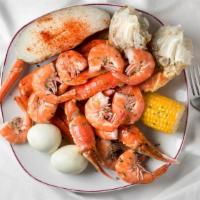 Large Snow Crab Combo · 2 Large Cluster, 8 Shrimps, 1 Egg, 1 potato, and 1 Corn.