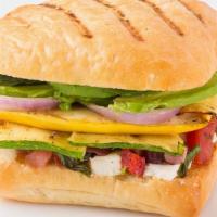 Half Vegetable Panini · Grilled Zucchini, Grilled Onions, Olive Salad, Baby Greens, Avocado, Grilled Squash, Feta Ch...
