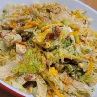 Chopped Salad · Chopped iceberg lettuce, bacon, cucumbers, cheddar cheese,. egg, scallions & tomatoes.. Toss...