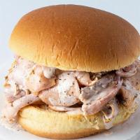 Chicken Sandwich · Pit smoked chicken, doused in our white sauce on a toasted bun.