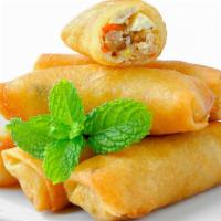 Crispy Chicken Egg Roll · Crispy roll filled with hearty chicken.