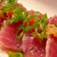 Tuna Tataki · Lightly grilled tuna and thin slice with ponzu sauce.