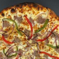 Philly Chzstk · Shaved beef, peppers and gooey cheese top this creamy white sauce pizza.