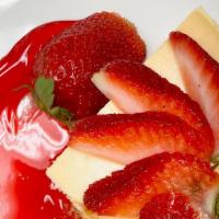 Cheesecake · Classic, plain and delicious cheesecake with strawberry  topping.