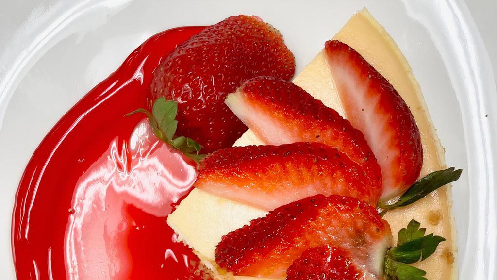 Cheesecake · Classic, plain and delicious cheesecake with strawberry  topping.