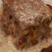 Meat Lasagna · Includes tossed salad or soup and garlic rolls.