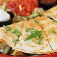 Quesadilla · Blackened chicken with cheese, sautéed peppers and onions, toasted on a flour tortilla; serv...