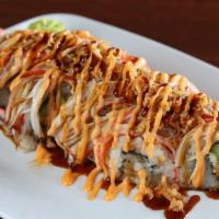 Crunchy Texas Roll · Seared white tuna, avocado, seaweed; topped with crab, fried onion, sushi sauce and spicy ma...