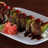 Surf & Turf Roll · Crab and cream cheese blend, spicy mayo, asparagus, seaweed; topped with avocado, seared fil...