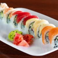 Rainbow Roll · California; topped with tuna, salmon, shrimp, white tuna and yellow tail. * *