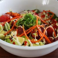 Poke Bowl · Choice of tuna or salmon; sushi rice, avocado, pickled radish and carrot, jalapeño, wasabi m...