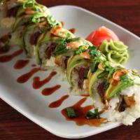 Chicago Roll · Soy paper, seared filet mignon, asparagus, scallions, cream cheese; topped with avocado, spi...