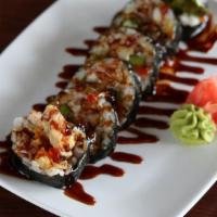 Soft Shell Crab Roll · Tempura soft shell crab, lettuce, avocado, seaweed; topped with sushi sauce and sweet chili ...