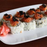 Volcano Roll · California; topped with ground spicy tuna and black tobiko. * *