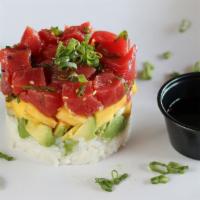 Tuna Stack · Spicy tuna, mango and avocado layered on sushi rice; citrus ponzu sauce and scallions. * *